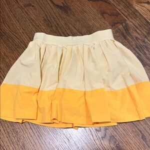 Athleta Girl yellow and gold pleated skirt